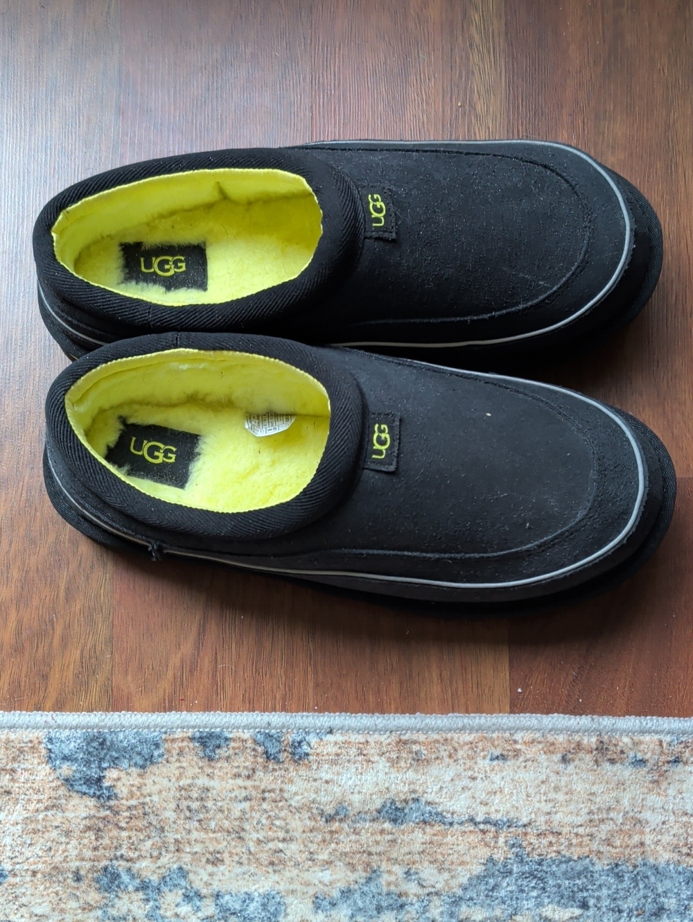 UGG Men’s Black Slip-On Loafers with Yellow Shearling Lining